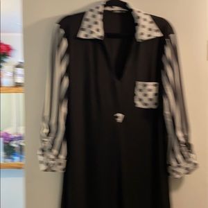 Top with polka dots and stripes sleeves